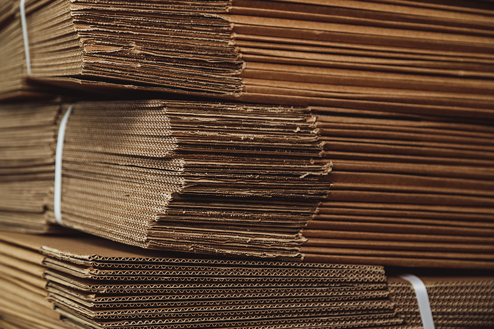 corrugated cardboard packing pile corrugated cardboard sheets warehouse